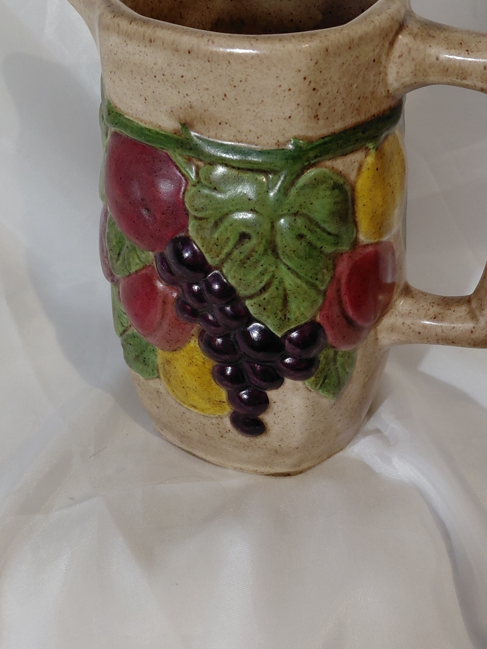 Decorative Ceramic Pitcher with Green Leaves and Purple Grapes